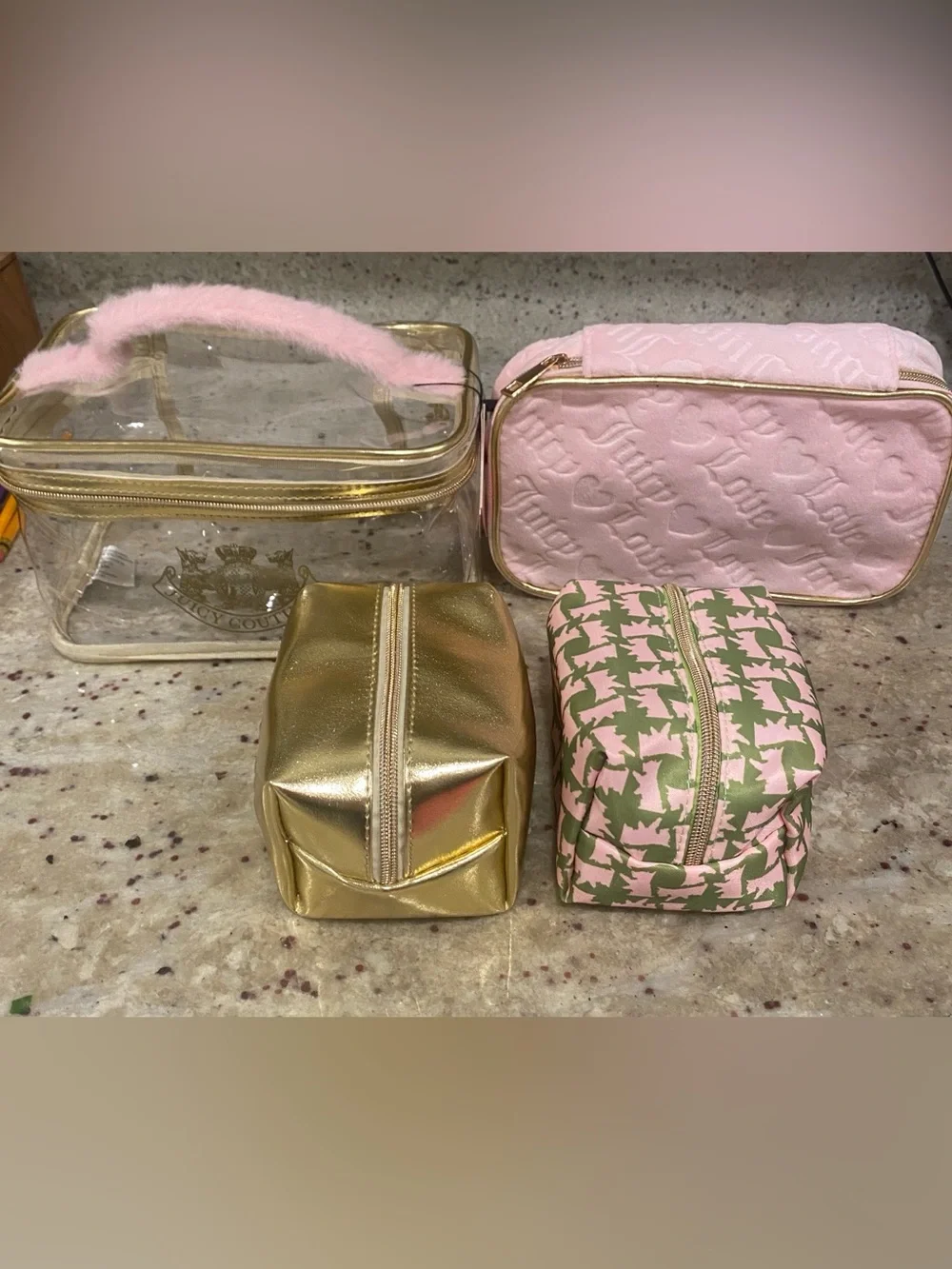 4 piece Juicy Couture Pink and Gold Quilted Cosmetic Carry Case.